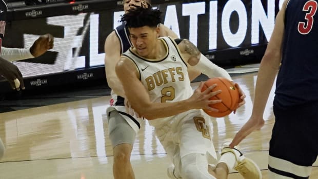 KJ Simpson driving to basketball vs. Arizona